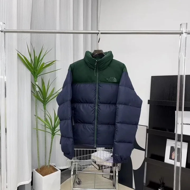 Retro Nuptse down jacket in a green and navy blue colorway
